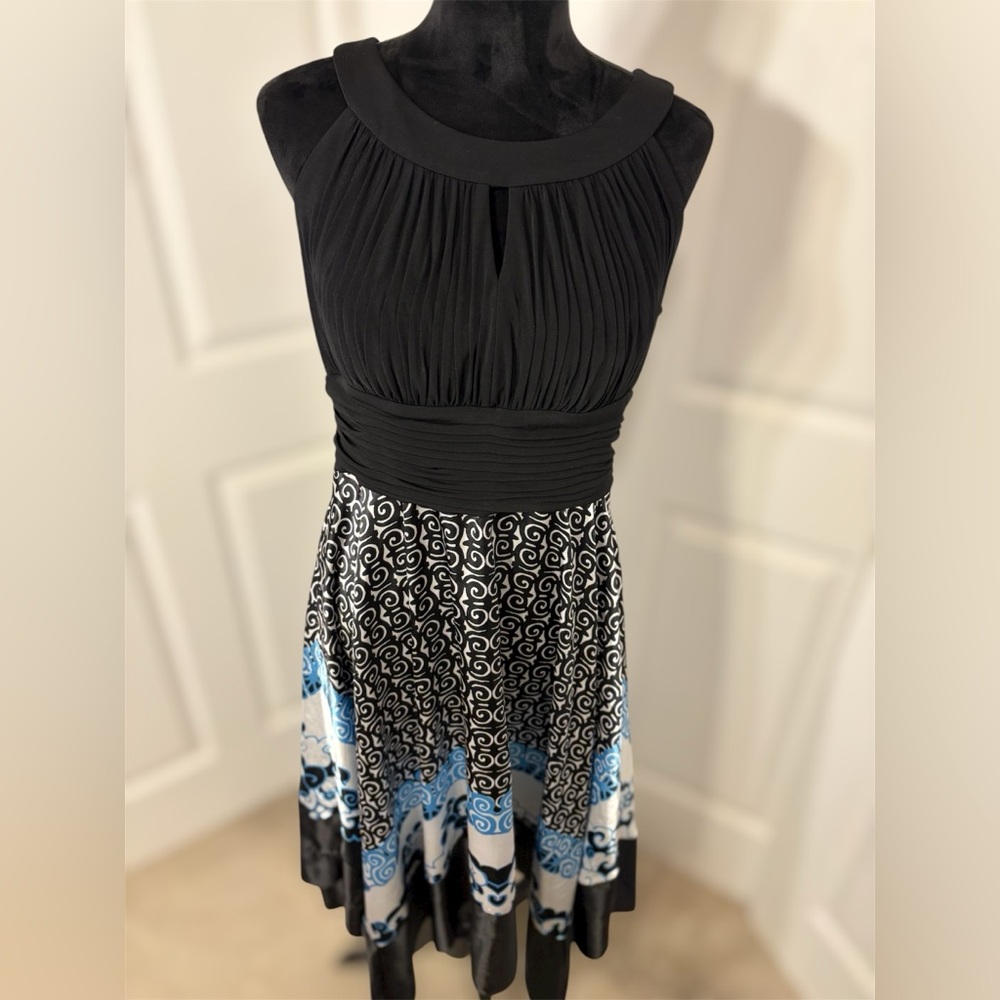 Melrose brand size 16 halter style dress. Black bodice, kerchief style skirt.